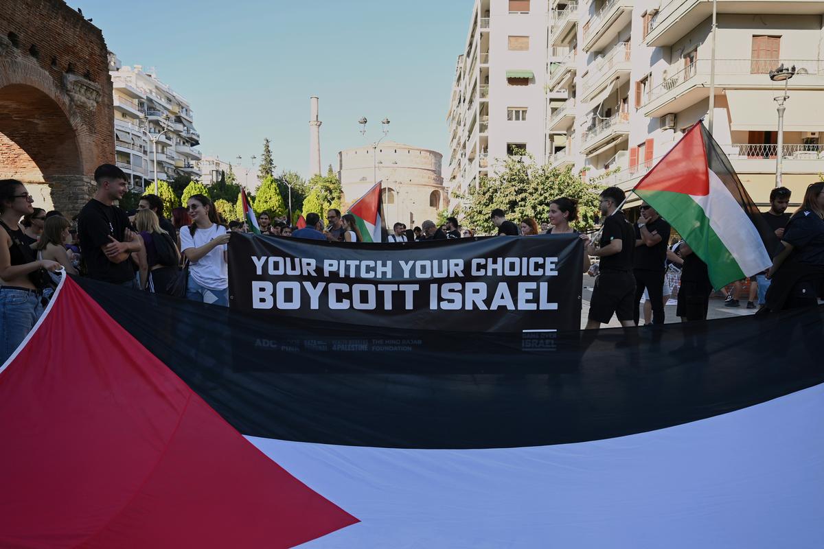 Pro-Palestinian protesters, most of them PAOK fans, gather ahead of a Europa League soccer match between PAOK and Israeli team Maccabi Tel Aviv in the port city of Thessaloniki, northern Greece Pro-Palestinian protesters, most of them PAOK fans, gather ahead of a Europa League soccer match between PAOK and Israeli team Maccabi Tel Aviv in the port city of Thessaloniki, northern Greece