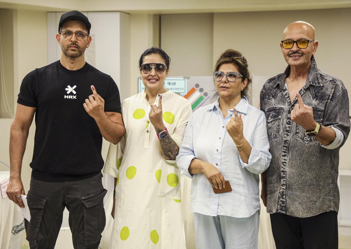 Mumbai: Actors Rakesh Roshan and Hrithik Roshan with family members show their inked fingers after casting their vote during the fifth phase of Lok Sabha elections in Mumbai on Monday, May 20, 2024.