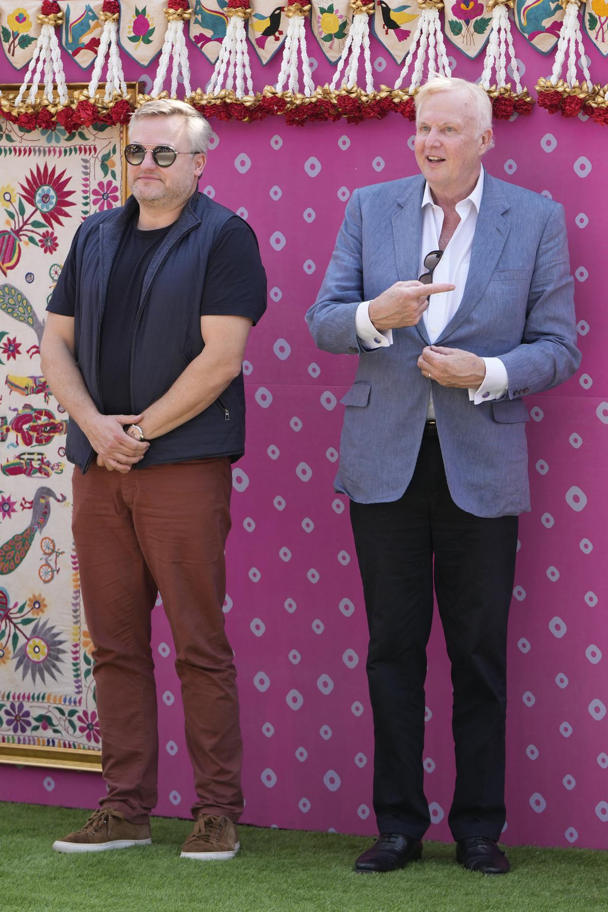 Murray Auchincloss, left, CEO of BP and Bob Dudley, former CEO of BP, pose for a photograph as they arrive to attend a pre-wedding bash of billionaire industrialist Mukesh Ambani’s son Anant Ambani, in Jamnagar, India