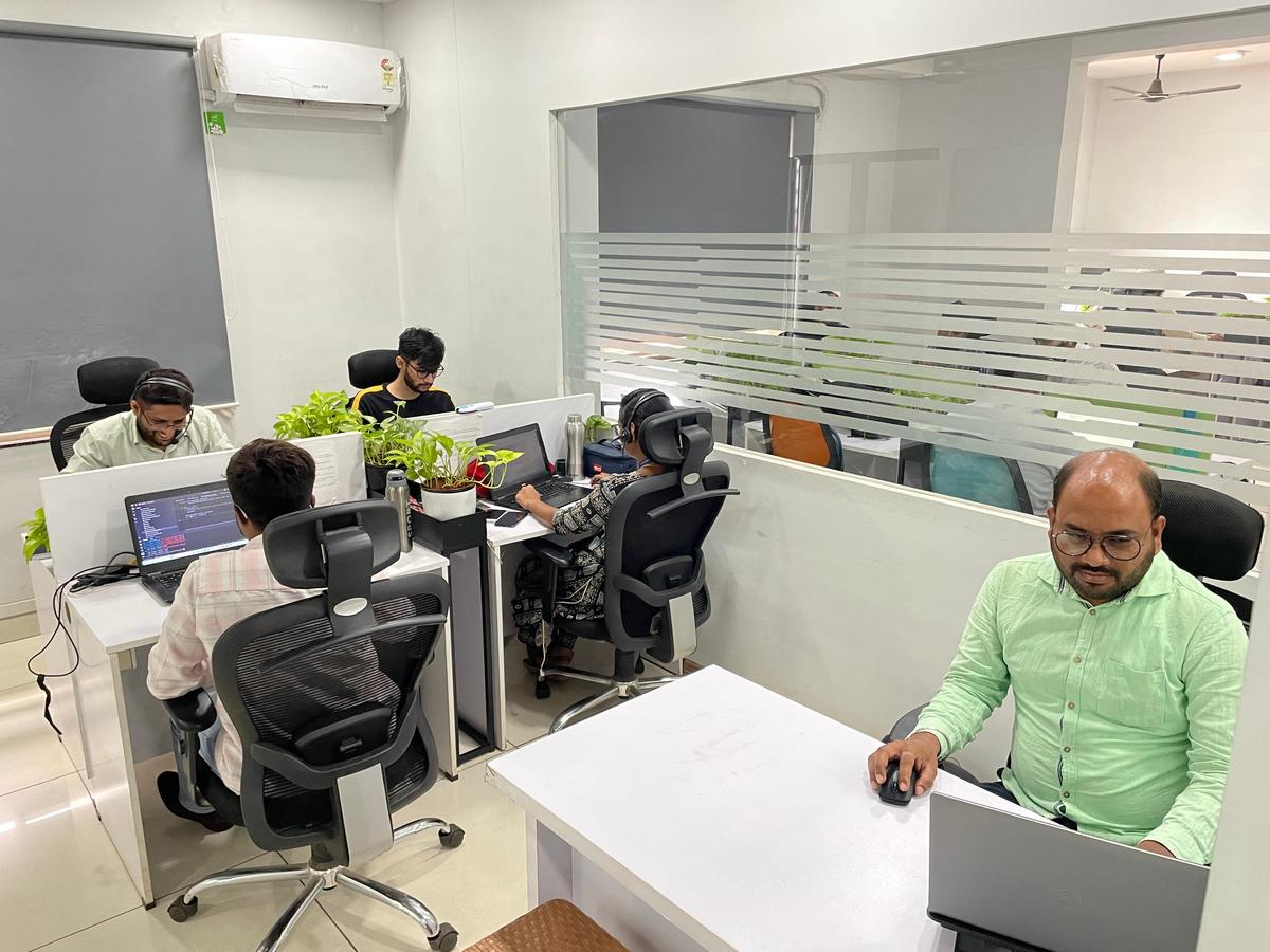 Young engineers work at the tiny office of Prosoft, a Belagavi-based IT company, whose products are sold overseas.