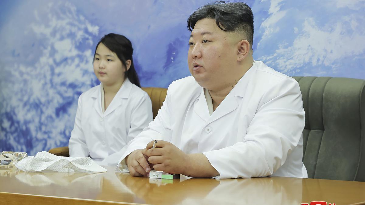 North Korean leader Kim Jong Un examines military spy satellite that may be launched soon