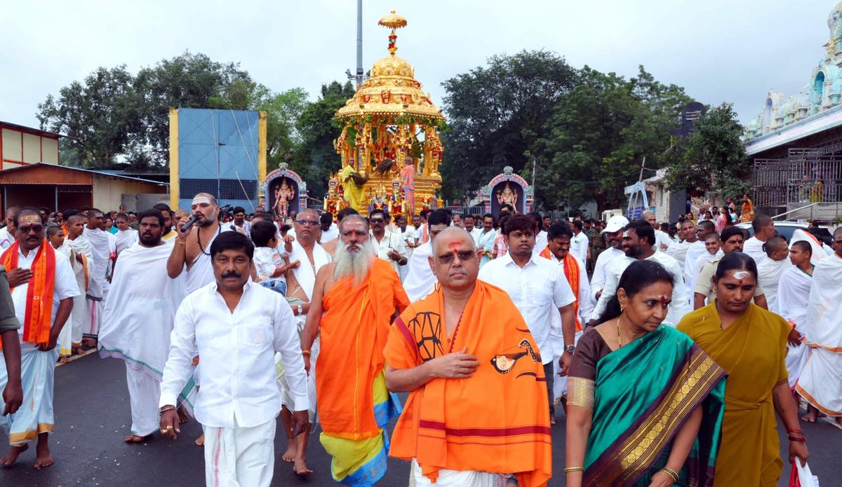 Processional deities of Sri Bhramaramba Mallikarjuna Swamy taken out on a procession as part of Swarna Radhotsavam in Srisailam temple town on Tuesday (September 16). Processional deities of Sri Bhramaramba Mallikarjuna Swamy taken out on a procession as part of Swarna Radhotsavam in Srisailam temple town on Tuesday (September 16).