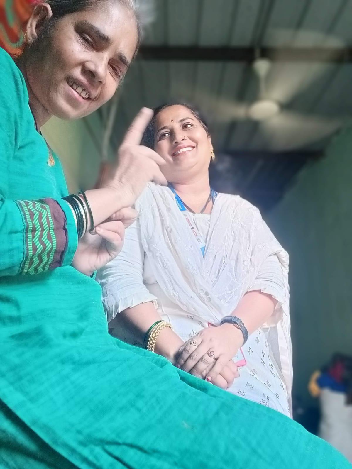 Kolhapur resident Haseena Atar (left) with Netradeepa Patel, the ASHA worker who nursed her back to health. 