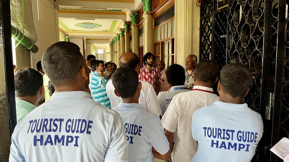 Participants of the Walking Guided Tour Programme of the Vidhana Soudha building, organised by Department of Tourism, Government of Karnataka, in Bengaluru on May 25, 2025.