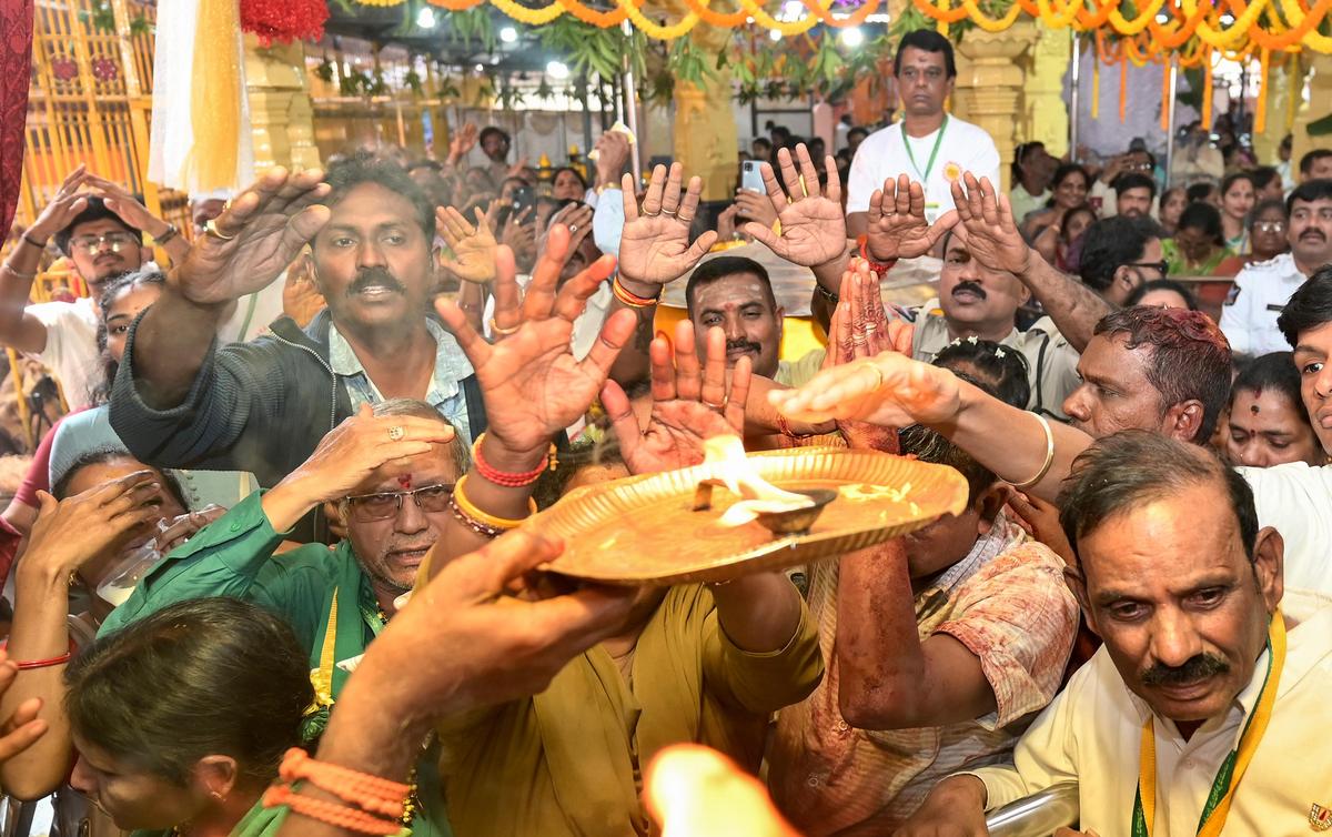 Devotees offer prayers and receive blessings at Sri Kanaka Mahalakshmi Temple on the first Thursday of ‘Margasira Masotsavam' at Burujupeta in Visakhapatnam on Thursday. Devotees offer prayers and receive blessings at Sri Kanaka Mahalakshmi Temple on the first Thursday of ‘Margasira Masotsavam' at Burujupeta in Visakhapatnam on Thursday.
