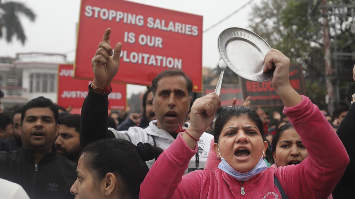 Facing threats, Pandit staff protest outside BJP office in Jammu