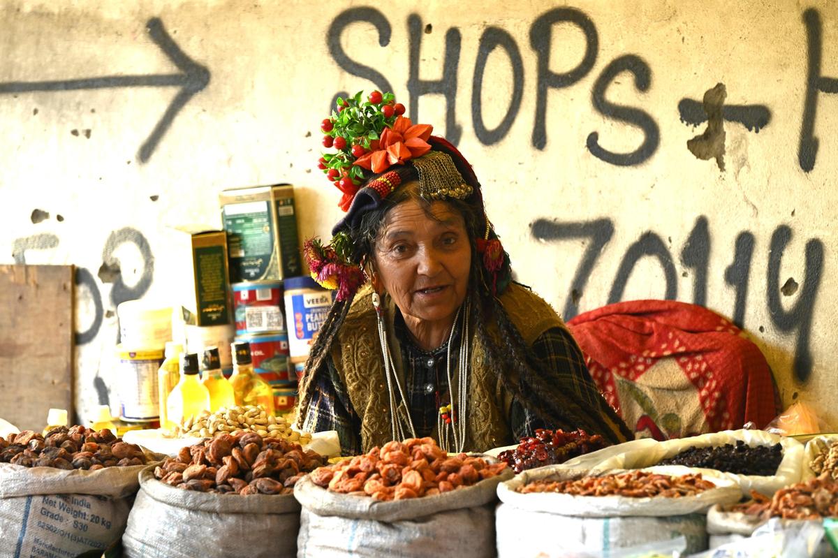 A Ladakhi woman selling apricots in Leh
