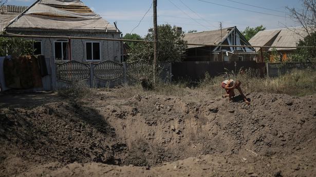 Six killed as rocket attack collapses apartment block in Ukraine’s Donbas