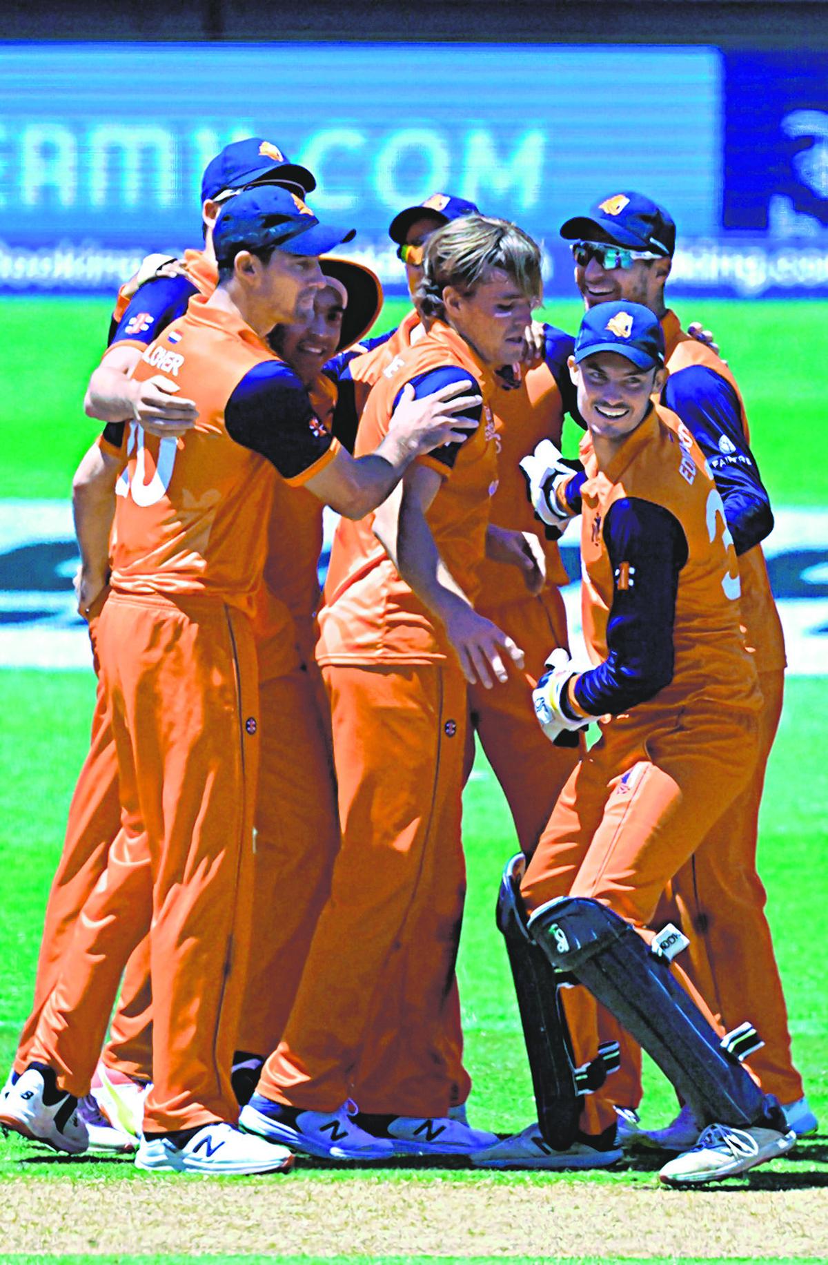 Netherlands’ players celebrate their win during the ICC men’s Twenty20 World Cup 2022 cricket match against South Africa at Adelaide Oval on November 6, 2022.