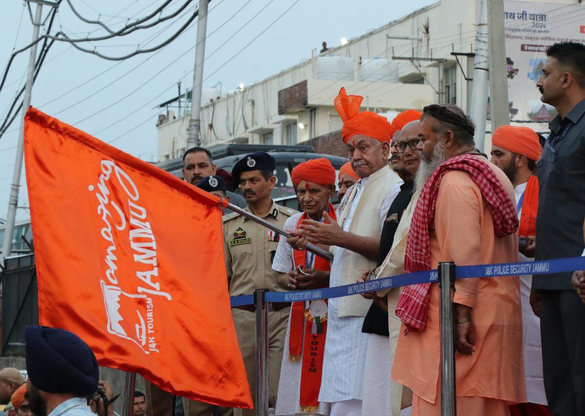 Jammu and Kashmir Lt Governor Manoj Sinha flags off the first batch of Amarnath Yatra pilgrims at a base camp, in Jammu, Friday, June 28, 2024.