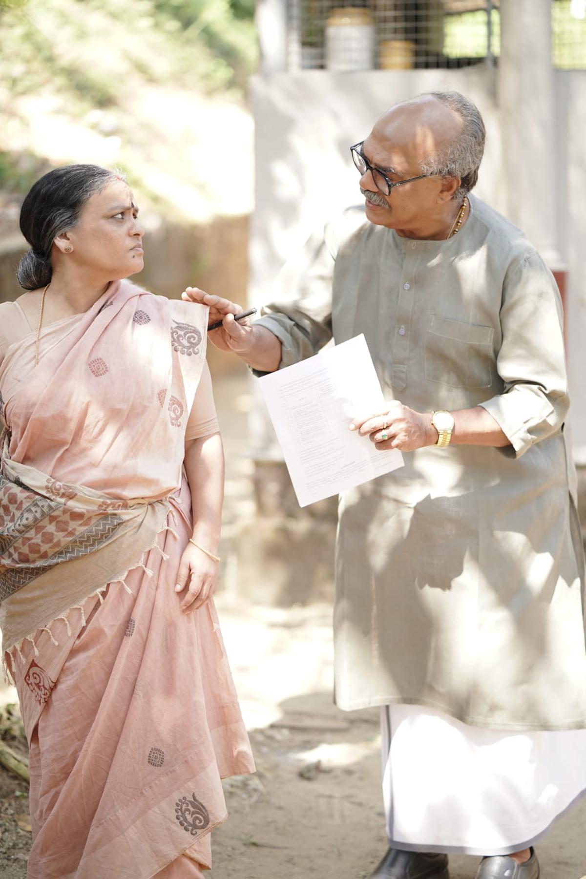 Jaya Kurup with Vijayaraghavan in a scene from Perilloor Premier League