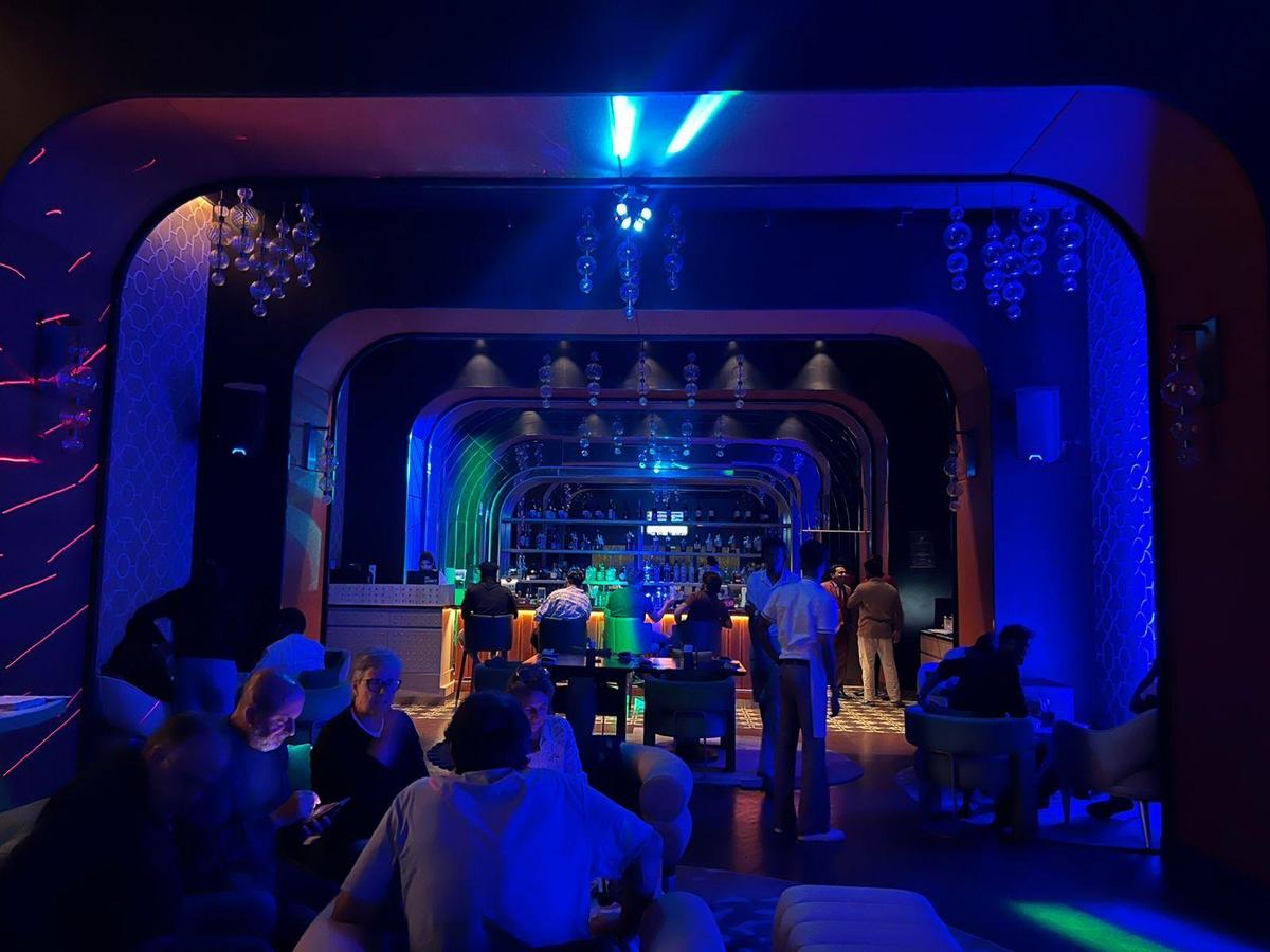 For MetroPlus: Under soft, vibrant lights, the DJ console comes alive at GRT Grand Hotel.