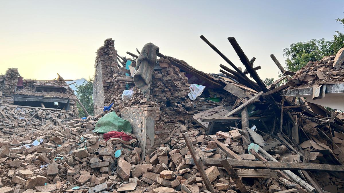 Thousands sleep outside in Nepal after earthquake kills at least 157 people and destroys most houses