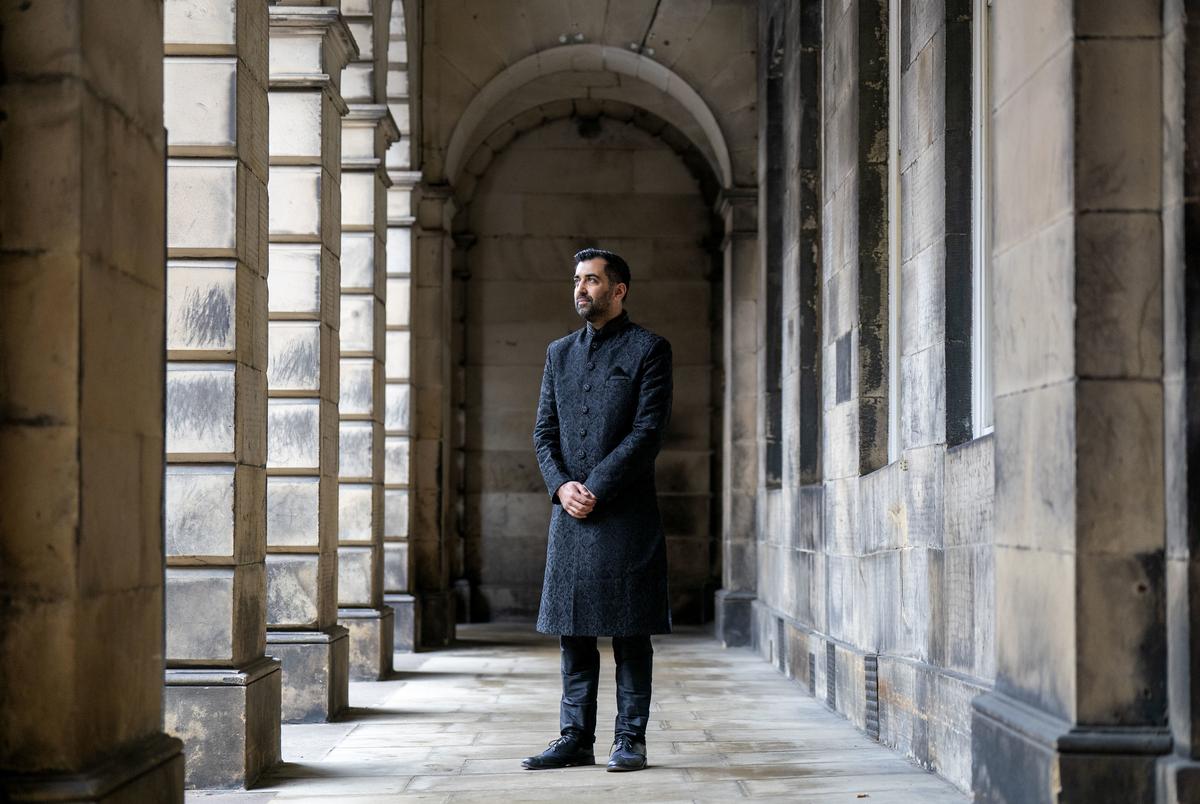 Humza Yousaf poses for a photo after being sworn in as First Minister of Scotland in Edinburgh.