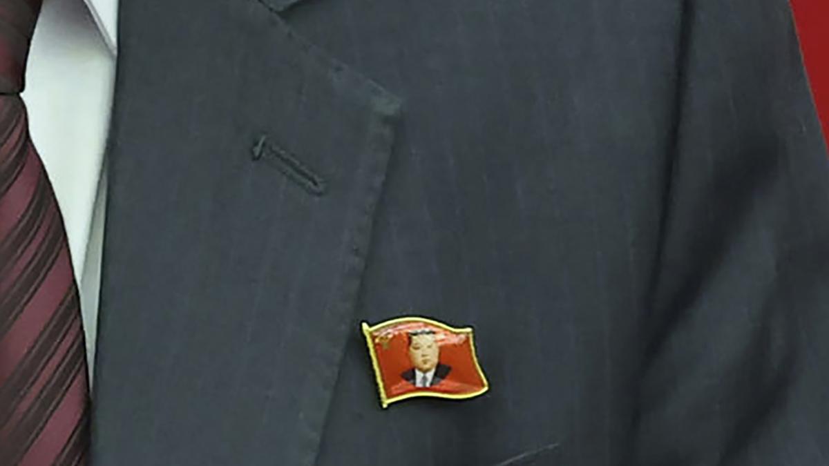 In a first, North Koreans seen wearing Kim Jong-un pins