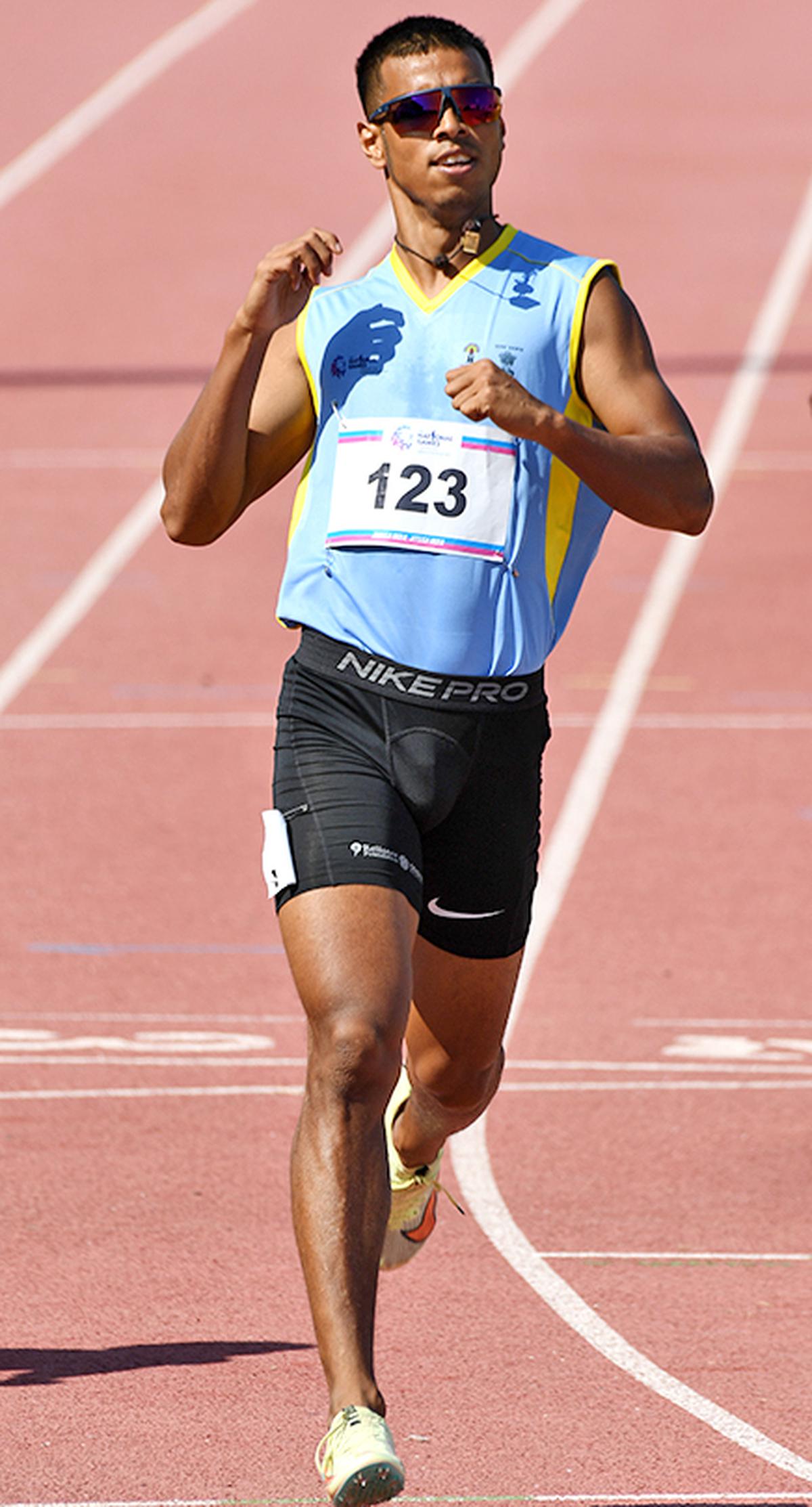 Amlan Borgohain of Assam during the 200M heats in the track and field events held at IIT Gandhinagar, during the 36th National Games in Gujarat. 