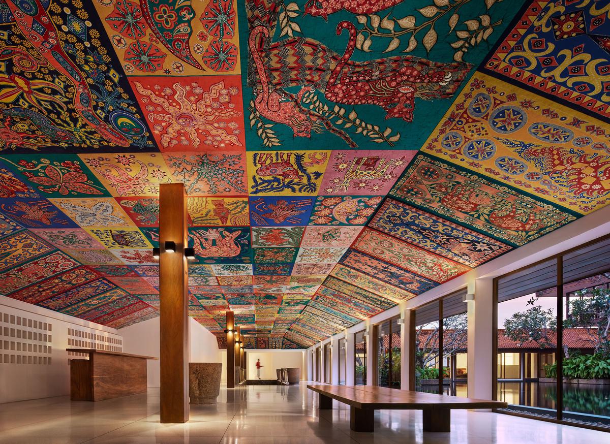 A view of the ceiling at the reception of the resort, done in rich batik, envisioned and brought to life by artist Ena de Silva