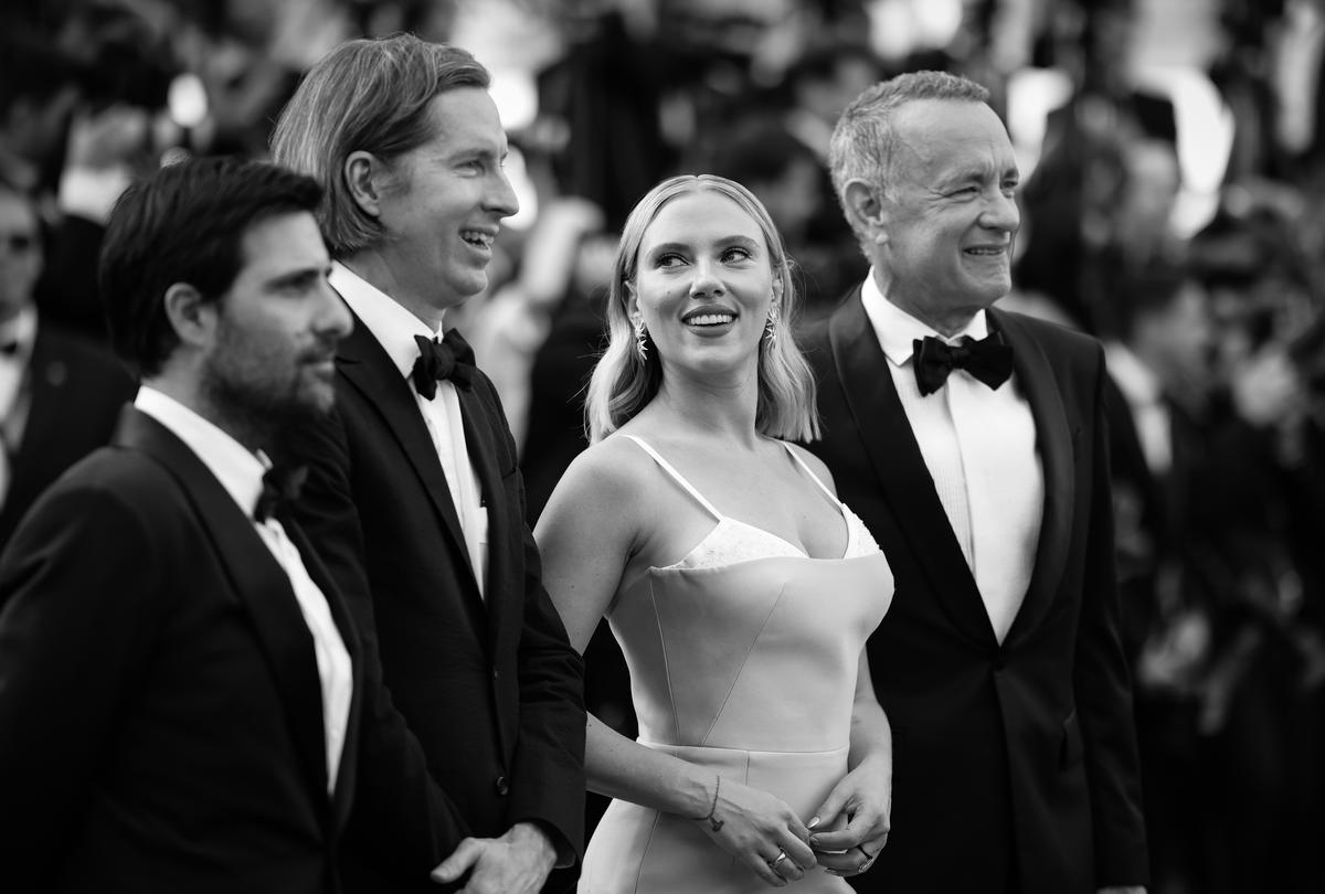 (L-R) Jason Schwartzman, Wes Anderson, Scarlett Johansson and Tom Hanks attend the Asteroid City red carpet during the 76th Cannes Film Festival
