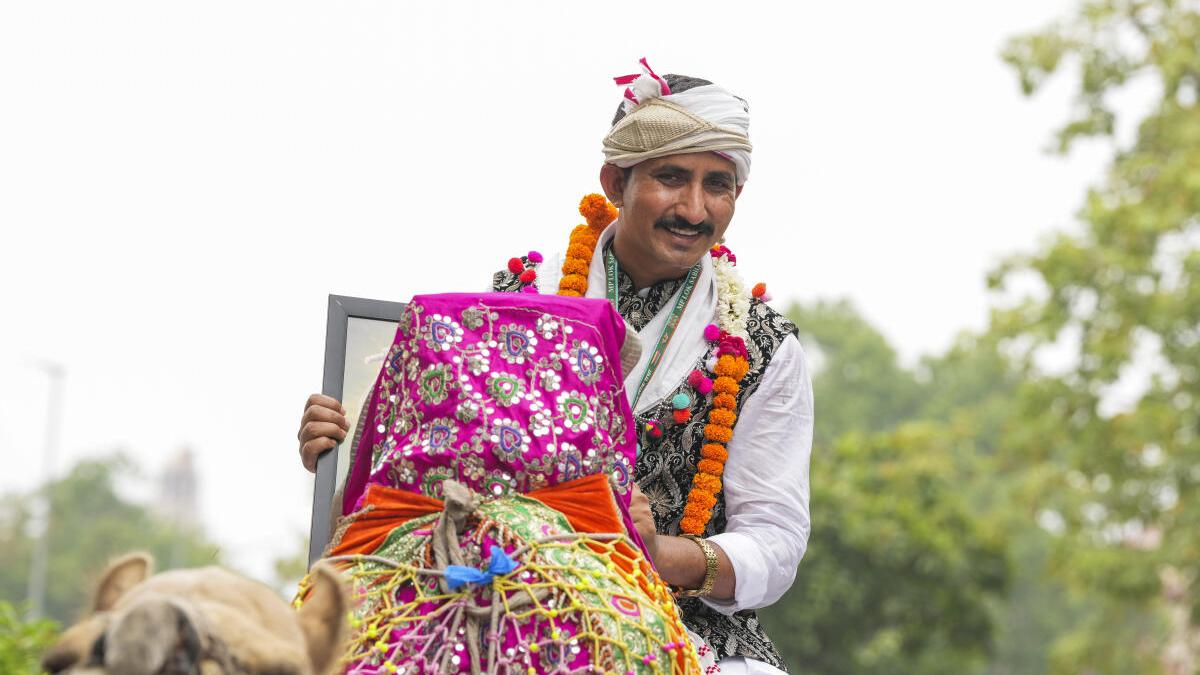 Watch: Rajasthan MP rides to Parliament on camel, stopped by cops - The ...