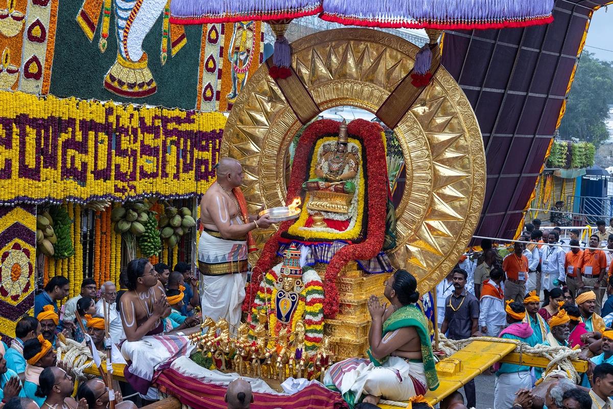 Lord Malayappa Swamy was taken out in a grand procession on the Surya Prabh...