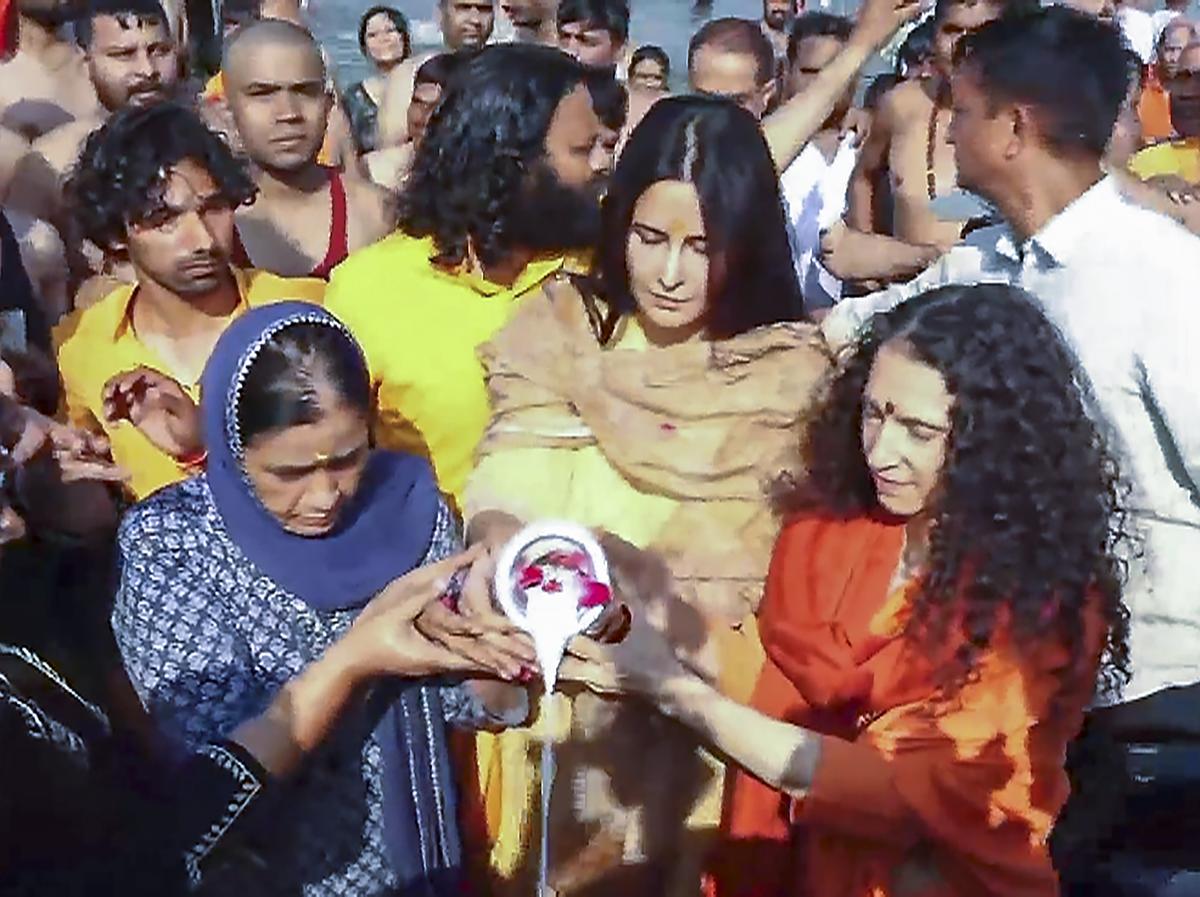 Bollywood actor Katrina Kaif performs rituals at the Sangam during the ongoing Mahakumbh Mela, in Prayagraj, UP, Monday, Feb. 24, 2025.