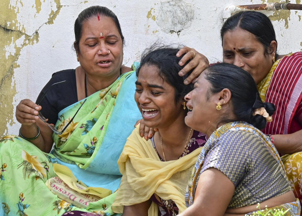 Family members of those who died in the accident mourn outside a hospital in Chevella. Family members of those who died in the accident mourn outside a hospital in Chevella.