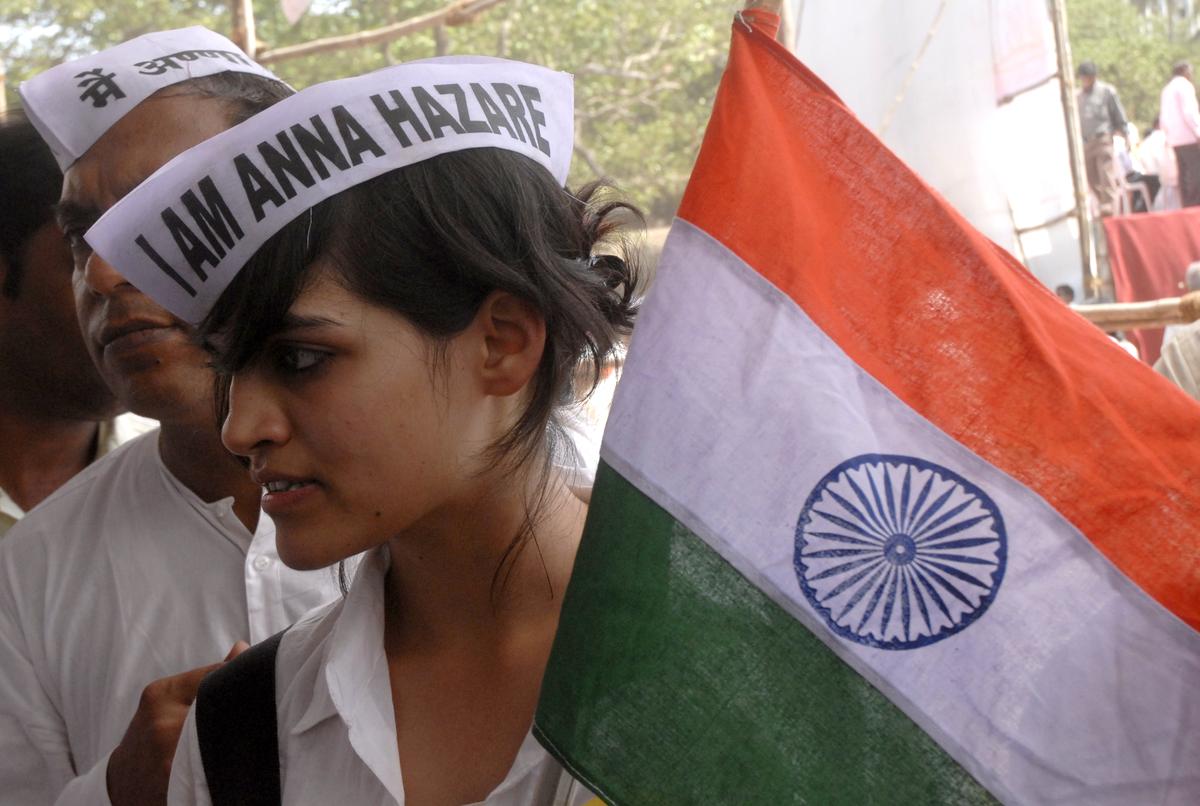 MUMBAI, 07/04/2011: Social activist Anna Hazare on the third day of his fast unto death campaign, demanding anti-corruption law on the lines of Lokpal Bill, at Jantar Mantar in New Delhi. Supporters of Anna Hazare wearing Gandhi Topi and holding a tricolour in her hand participate in rally, 'India Against Corruption' at Azad maidan in Mumbai on April 07, 2011.
Photo: Vivek Bendre MUMBAI, 07/04/2011: Social activist Anna Hazare on the third day of his fast unto death campaign, demanding anti-corruption law on the lines of Lokpal Bill, at Jantar Mantar in New Delhi. Supporters of Anna Hazare wearing Gandhi Topi and holding a tricolour in her hand participate in rally, 'India Against Corruption' at Azad maidan in Mumbai on April 07, 2011.
Photo: Vivek Bendre