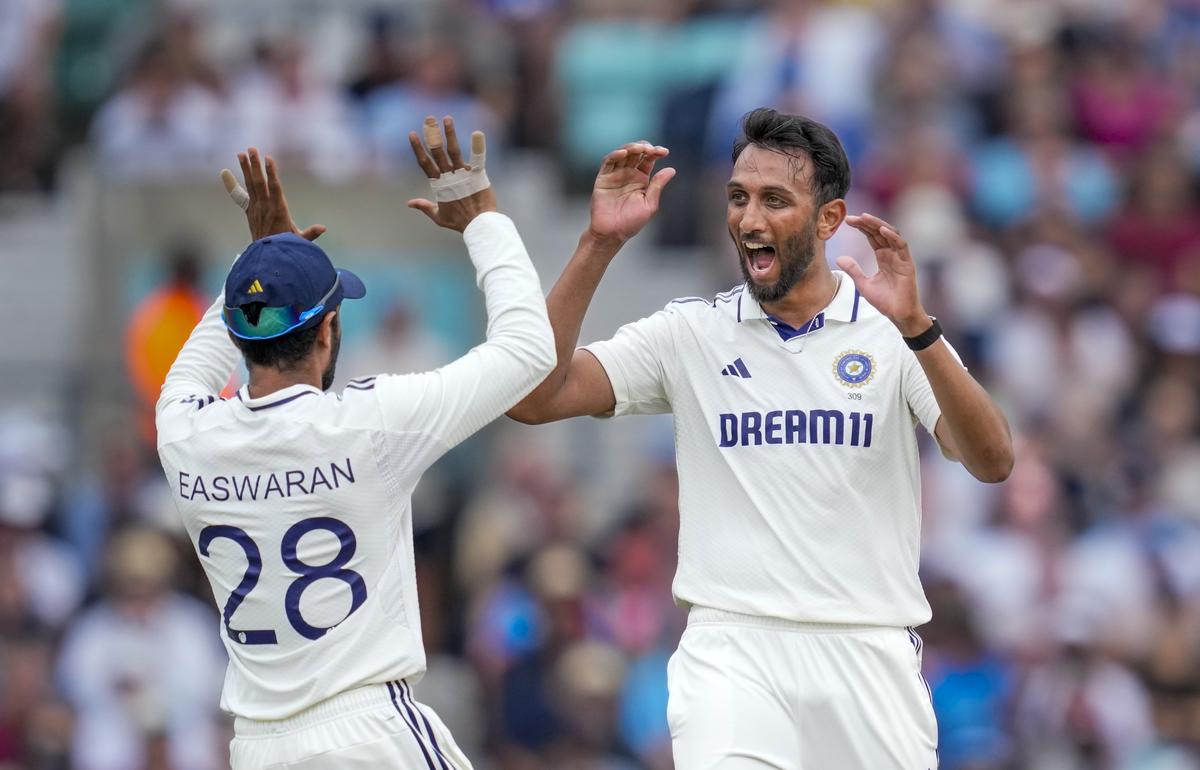 Prasidh Krishna celebrates with Abhimanyu Easwaran after taking the wicket of Ben Duckett.