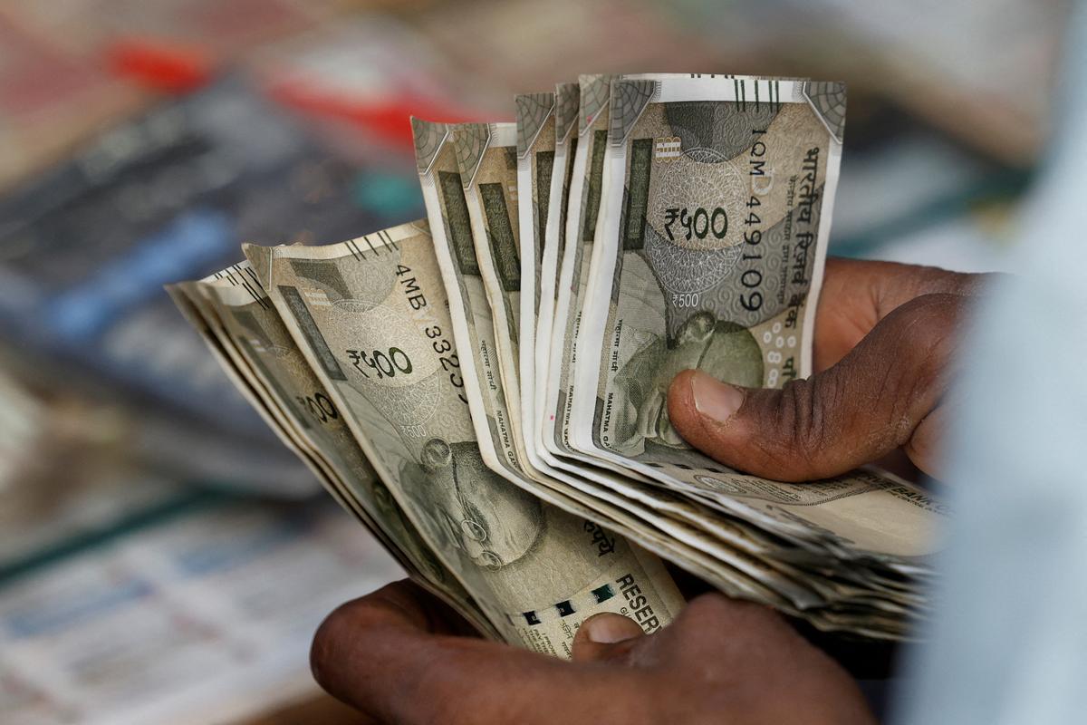 Rupee falls 8 paise to 85.70 against U.S. dollar in early trade - The Hindu