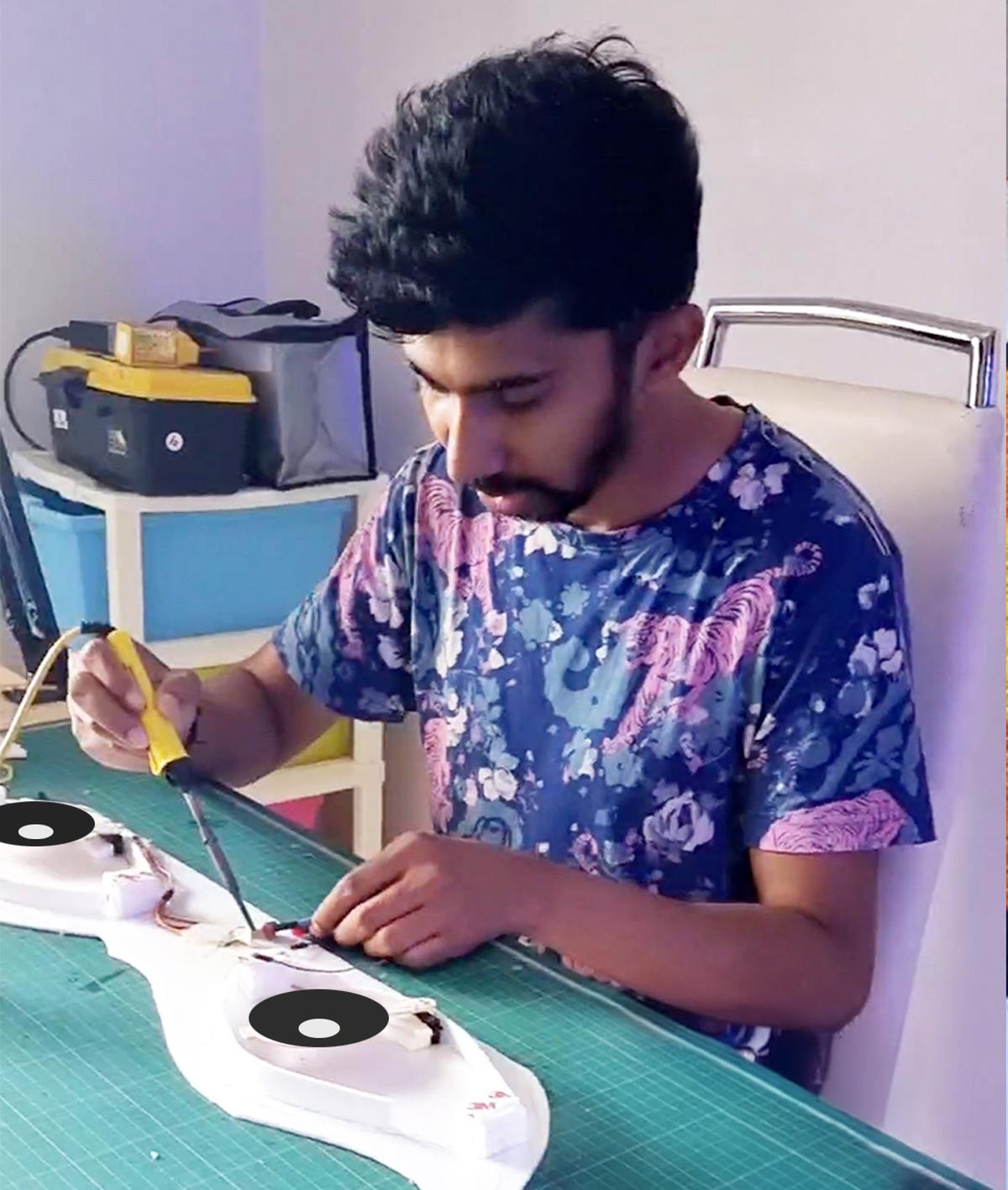 Rahul R designing the eyes of Kathakali dancer