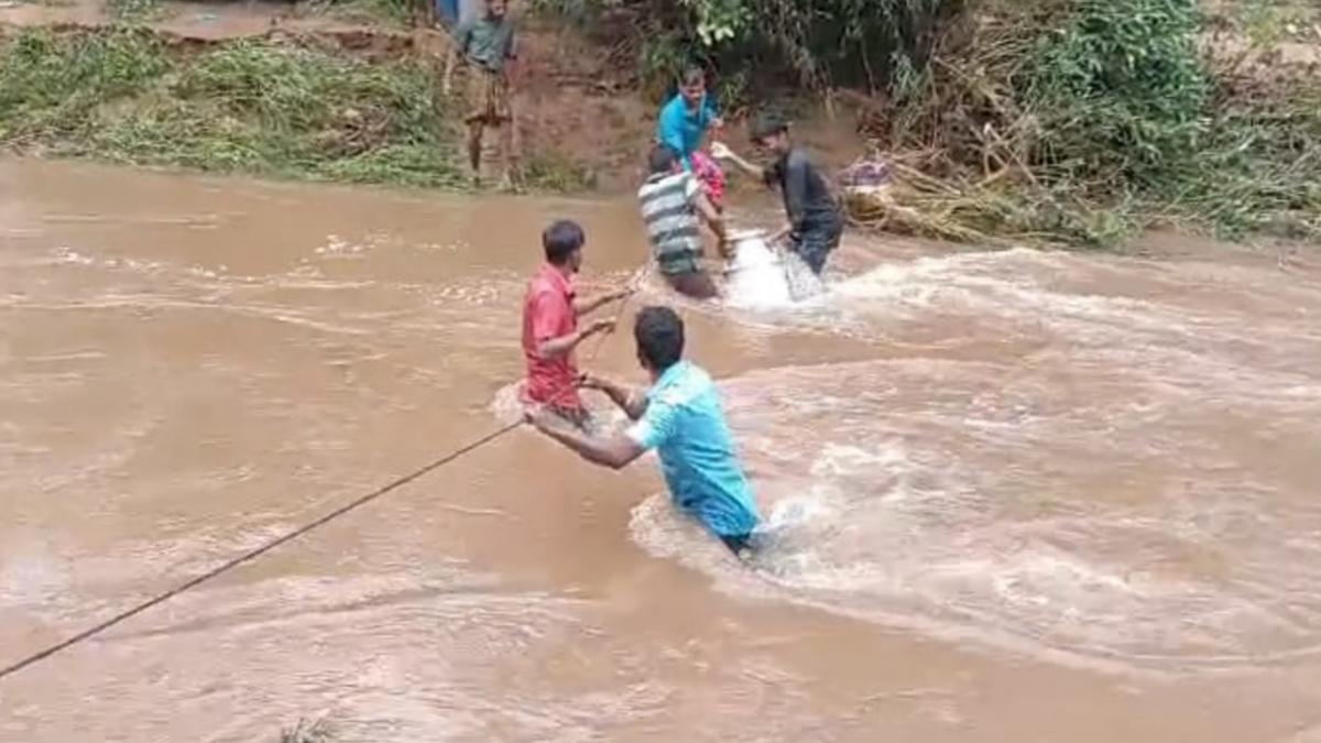 Villagers brave flooded river to transport milk in Dharmapuri