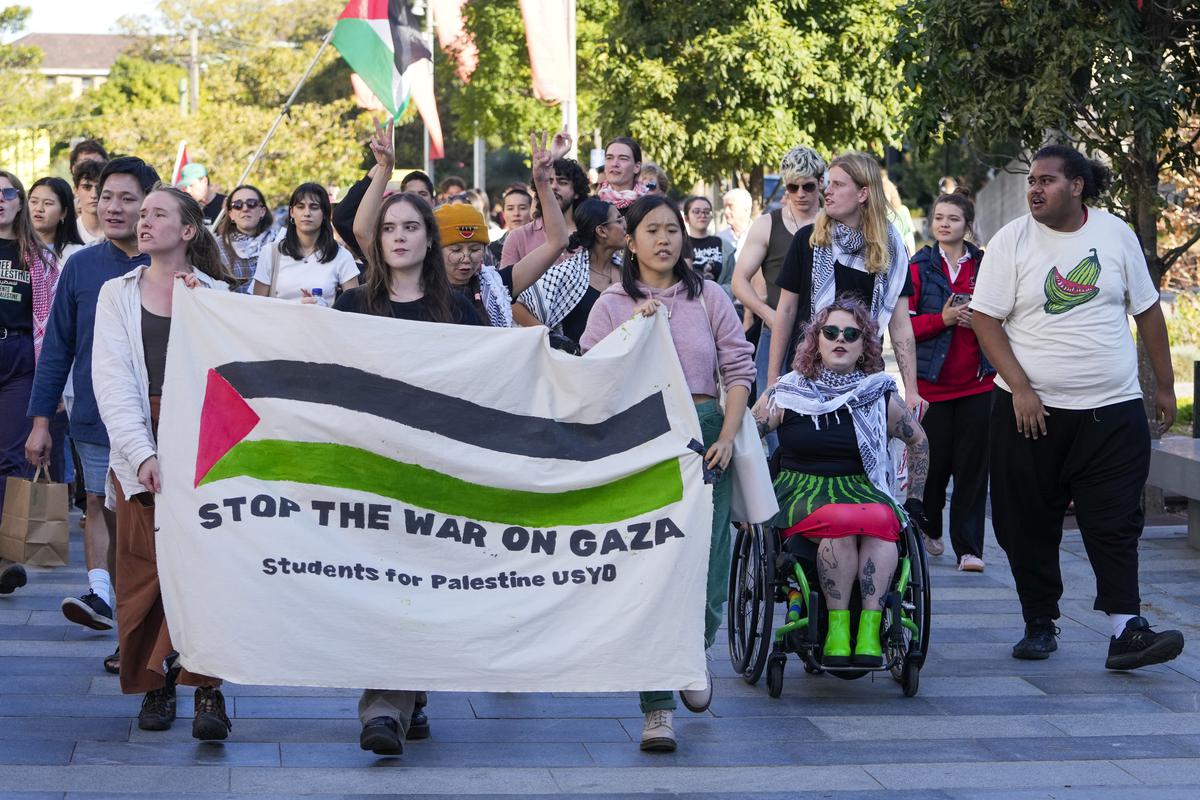 Pro-Palestinian protesters demonstrate at the University of Sydney to protest the Israel-Gaza war on April 24, 2024. 
