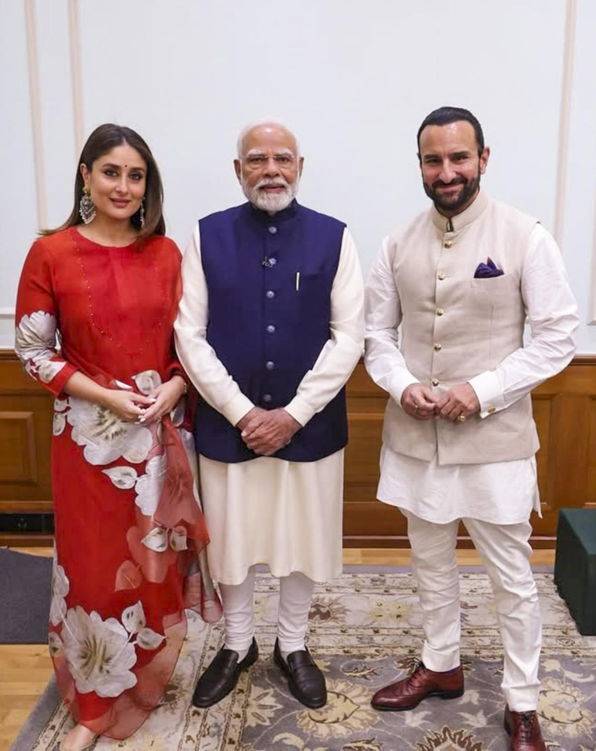 New Delhi: Prime Minister Narendra Modi with actors Kareena Kapoor Khan and Saif Ali Khan, in New Delhi, Tuesday, Dec. 10, 2024. The entire Kapoor family, including Ranbir Kapoor, Alia Bhatt, Neetu Singh, Kareena Kapoor Khan, Saif Ali Khan, Karisma Kapoor and others met Prime Minister Modi and invited him to the Raj Kapoor Film Festival to be organised to commemorate the 100th birth anniversary of the legendary actor-filmmaker. (PTI Photo)(PTI12_11_2024_000035B)