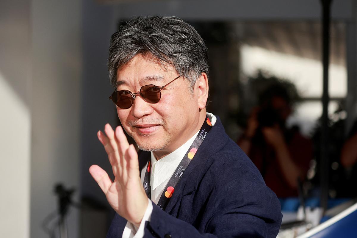 Jury member Hirokazu Kore-eda arrives at the Hotel Martinez on the eve of the opening of the 77th Cannes Film Festival
