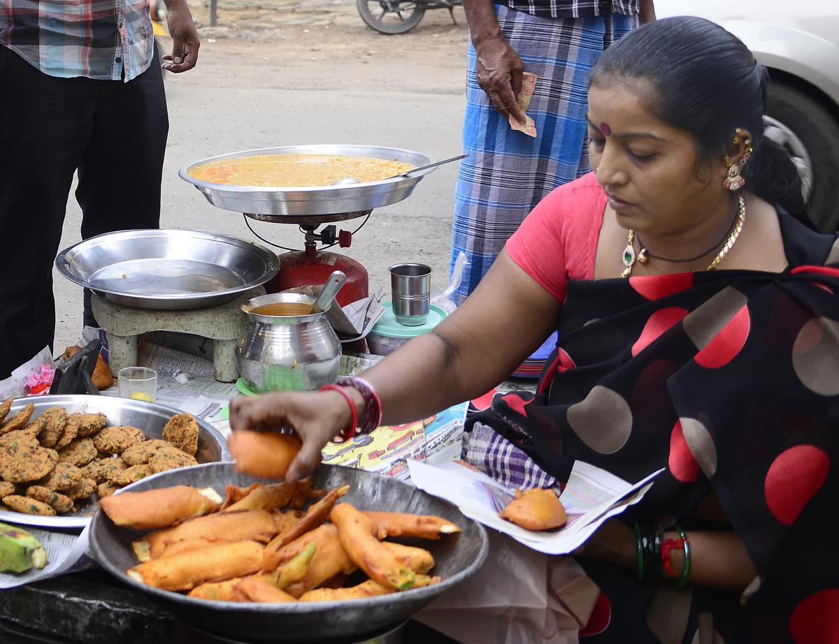 CHENNAI, TAMIL NADU, 04/11/2014: Bajjis and bondas being prepared at the Bajji Stall on East Mada Street, Mylapore in Chennai on November 04, 2014.
Photo: R. Ravindran CHENNAI, TAMIL NADU, 04/11/2014: Bajjis and bondas being prepared at the Bajji Stall on East Mada Street, Mylapore in Chennai on November 04, 2014.
Photo: R. Ravindran