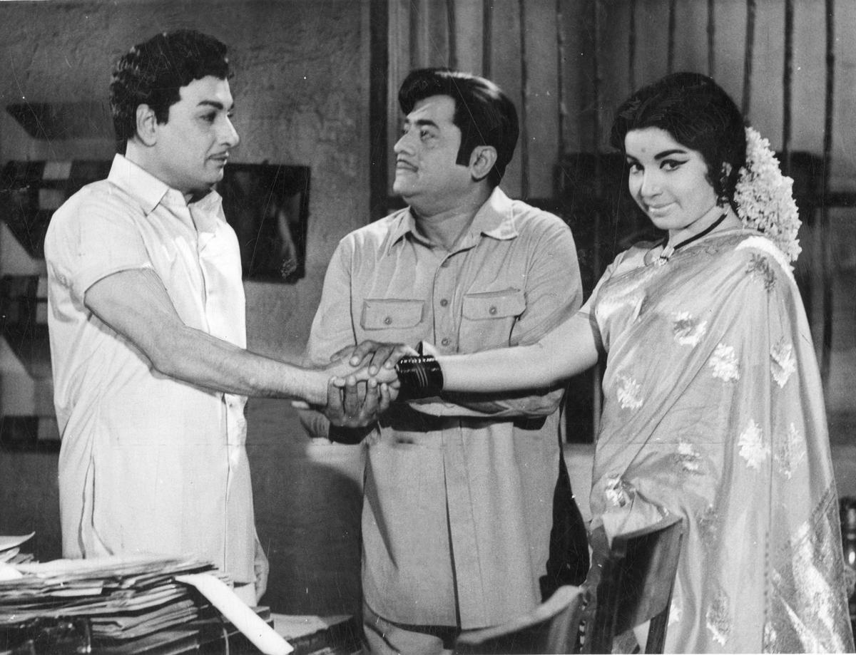In the 1969 Tamil film name Nadu, MG Ramachandran and J. Manohar with Jayalalithaa. In the 1969 Tamil film name Nadu, MG Ramachandran and J. Manohar with Jayalalithaa.