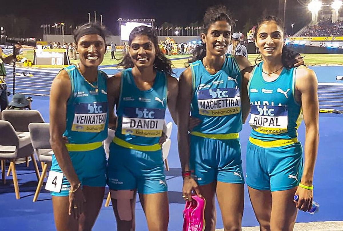 Indian women’s 4x400m relay team members pose for photos after qualifying for Paris Olympics at the World Athletics Relays, in Nassau, Bahamas on May 6, 2024.