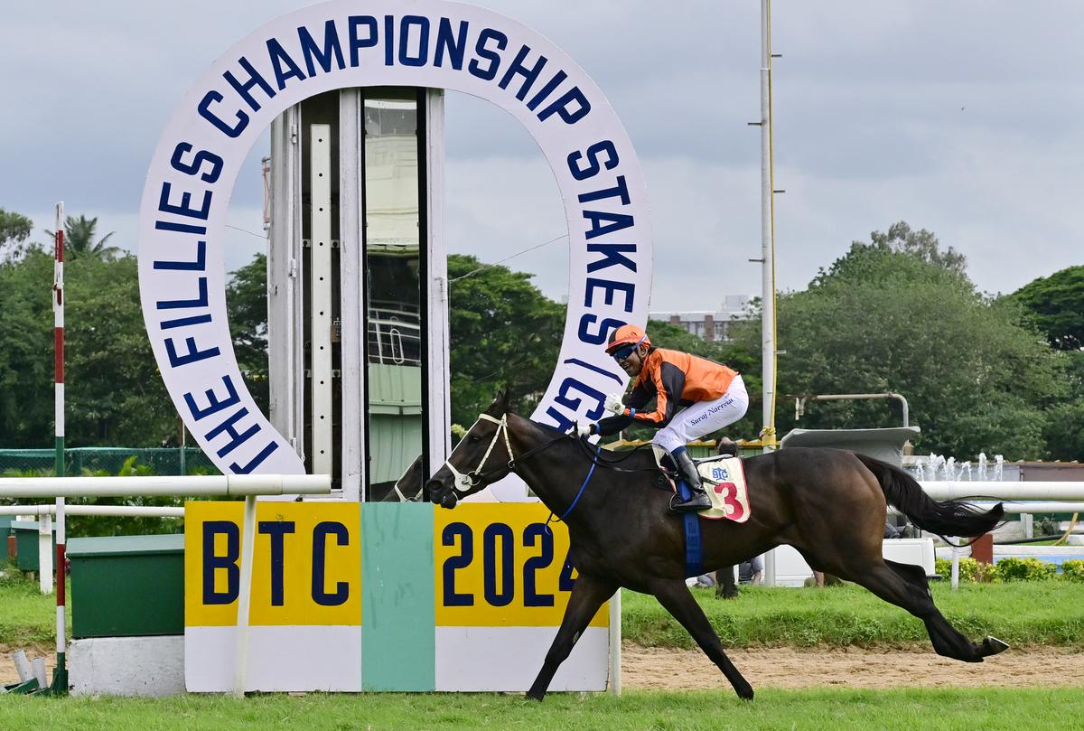 Excellent Lass ridden by jockey Suraj Narredu winning The Fillies Championship Stakes, at the BTC, in Bengaluru on August 03, 2024. 