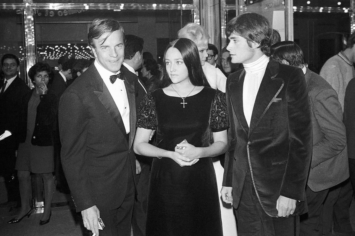 “Romeo and Juliette” movie director Franco Zeffirelli (left), actors Olivia Hussey (centre), and Leonard Whiting (right) are seen after the Parisian premiere of the film in Paris on September 25, 1968.