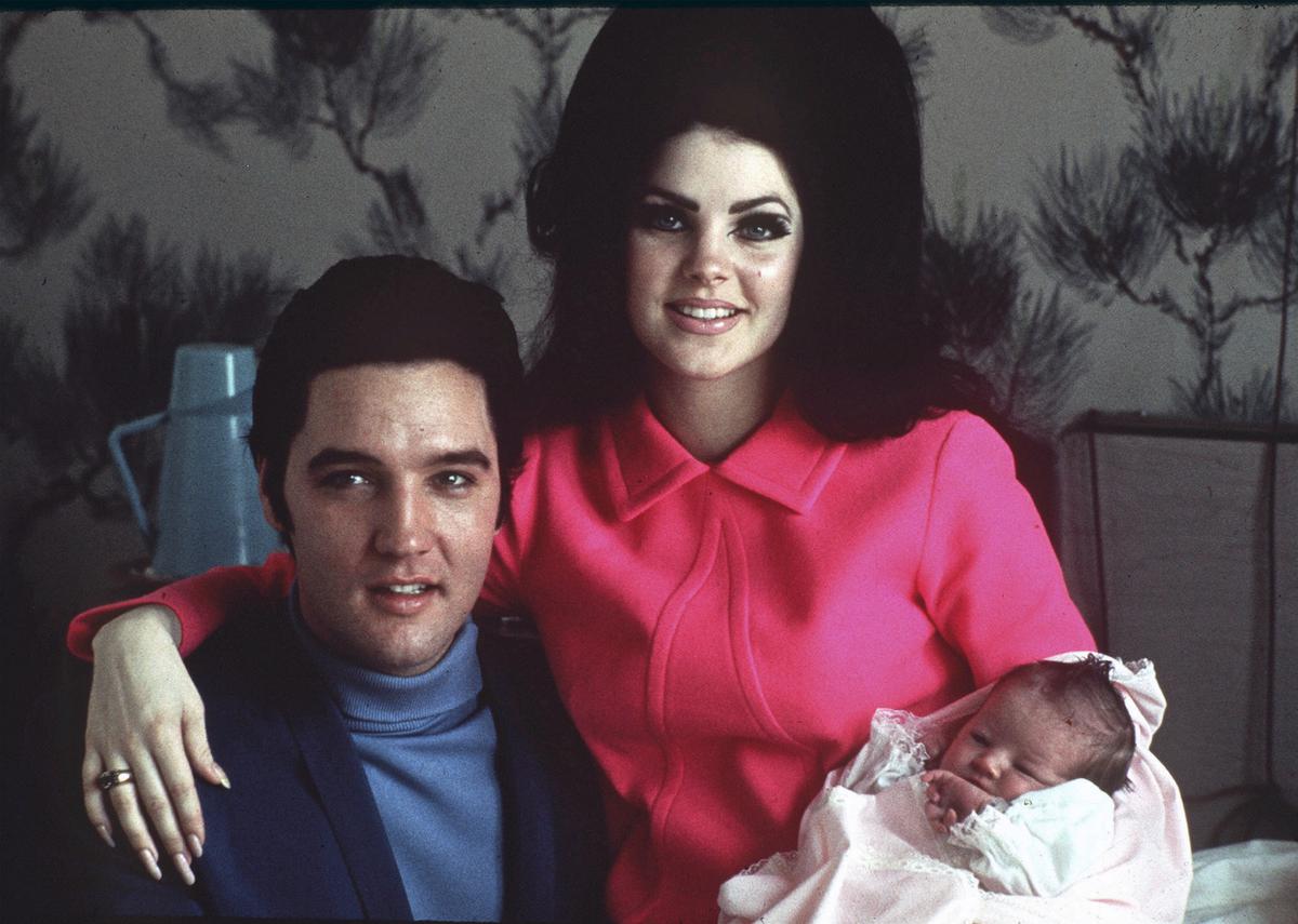 Elvis Presley with wife Priscilla and daughter Lisa Marie in a room at Baptist Hospital on February 5, 1968, in Memphis, Tenn. 