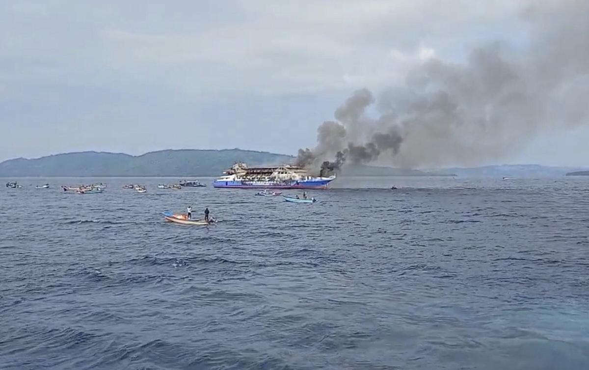 Smoke billows from passenger ship KM Barcelona after it caught fire in the waters off Talise Island in North Sulawesi, Indonesia, on July 20, 2025. Photo: BASARNAS via AP
