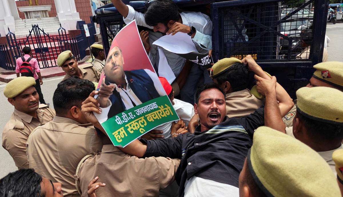 The Samajwadi Party (SP) workers protests in Lucknow over the school merger/pairing decision of U.P. government. 