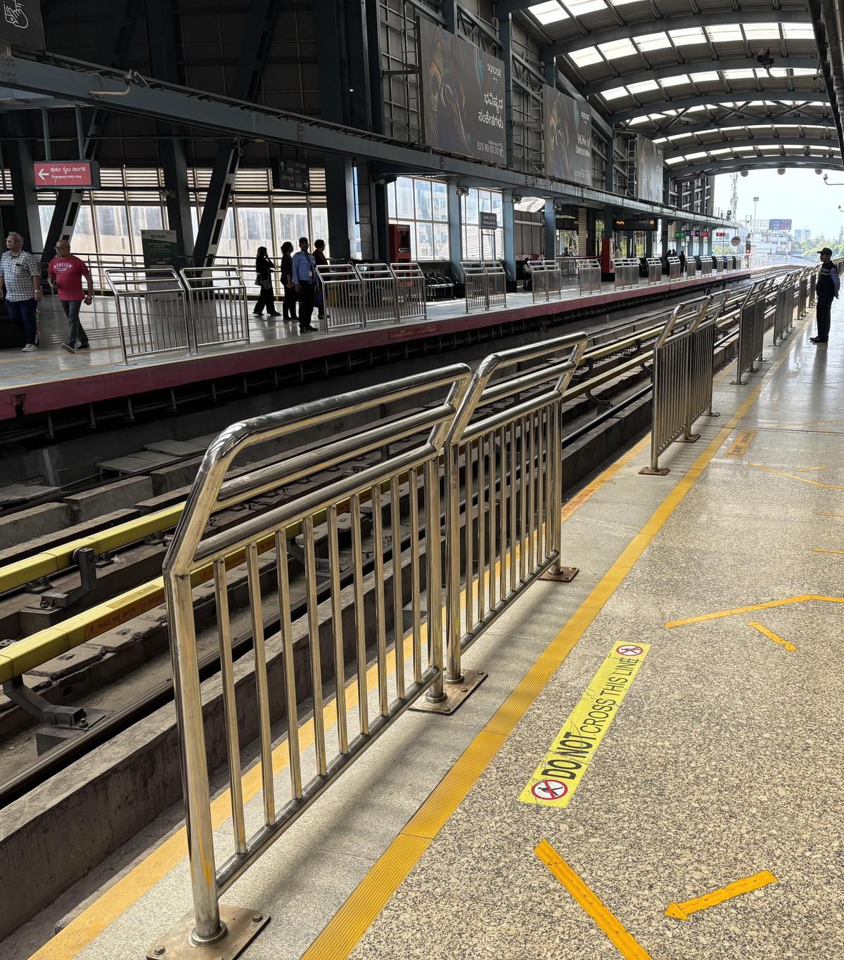 New handrail barricades installed at M.G. Road Metro station in Bengaluru on Sunday.