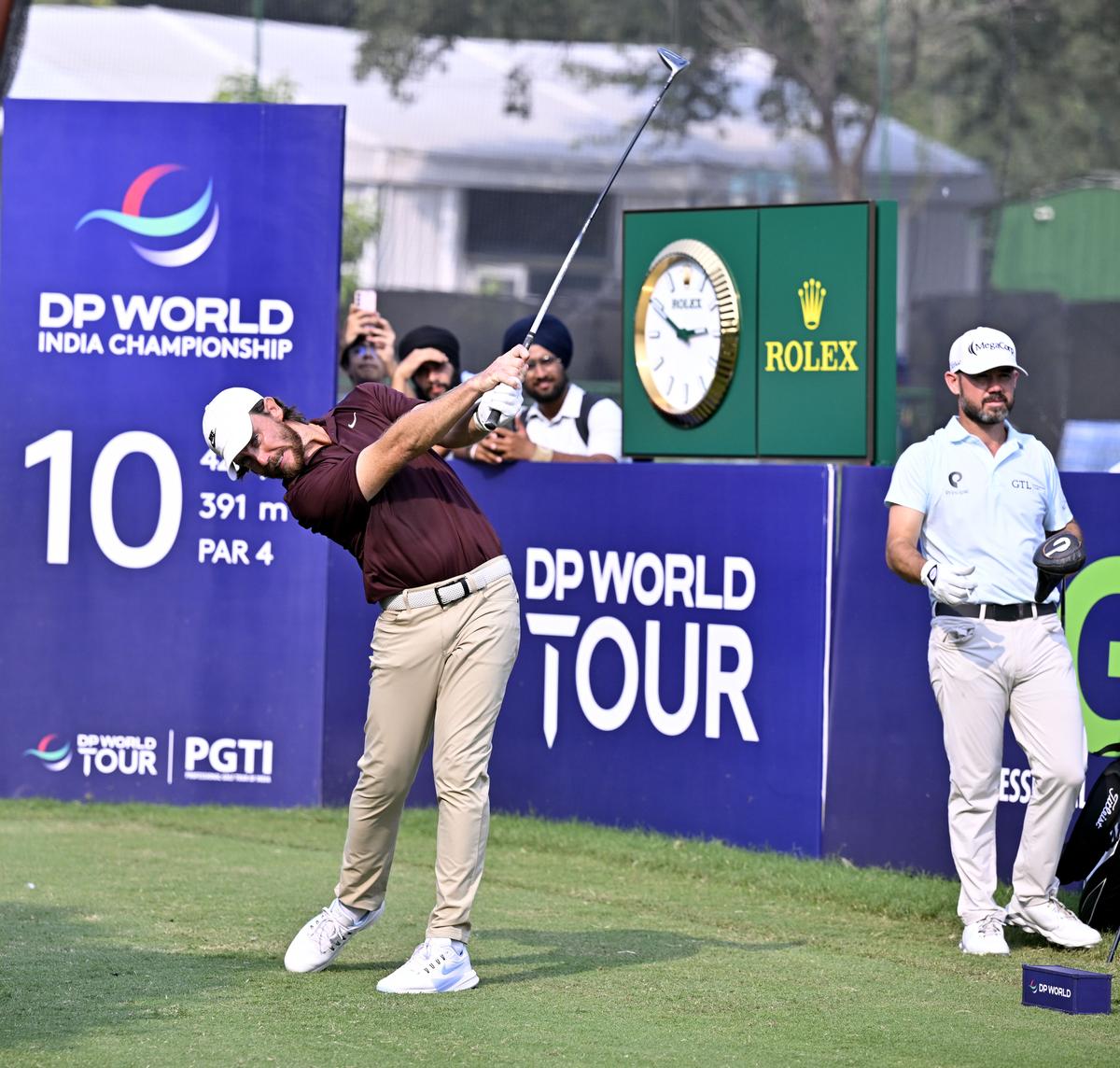 England’s Tommy Fleetwood plays a shot at the DP World India Championship golf tournament at the Delhi Golf Club in New Delhi on Saturday, October 18, 2025. England’s Tommy Fleetwood plays a shot at the DP World India Championship golf tournament at the Delhi Golf Club in New Delhi on Saturday, October 18, 2025.