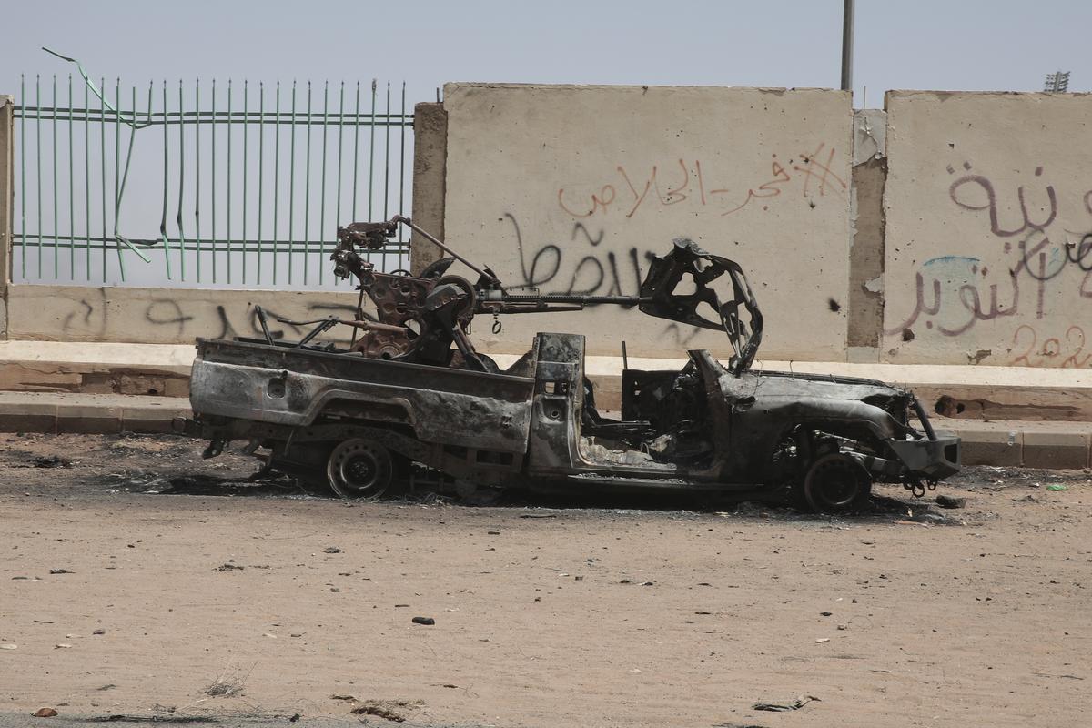 A destroyed military vehicle is seen in southern in Khartoum, Sudan on April 20, 2023. 