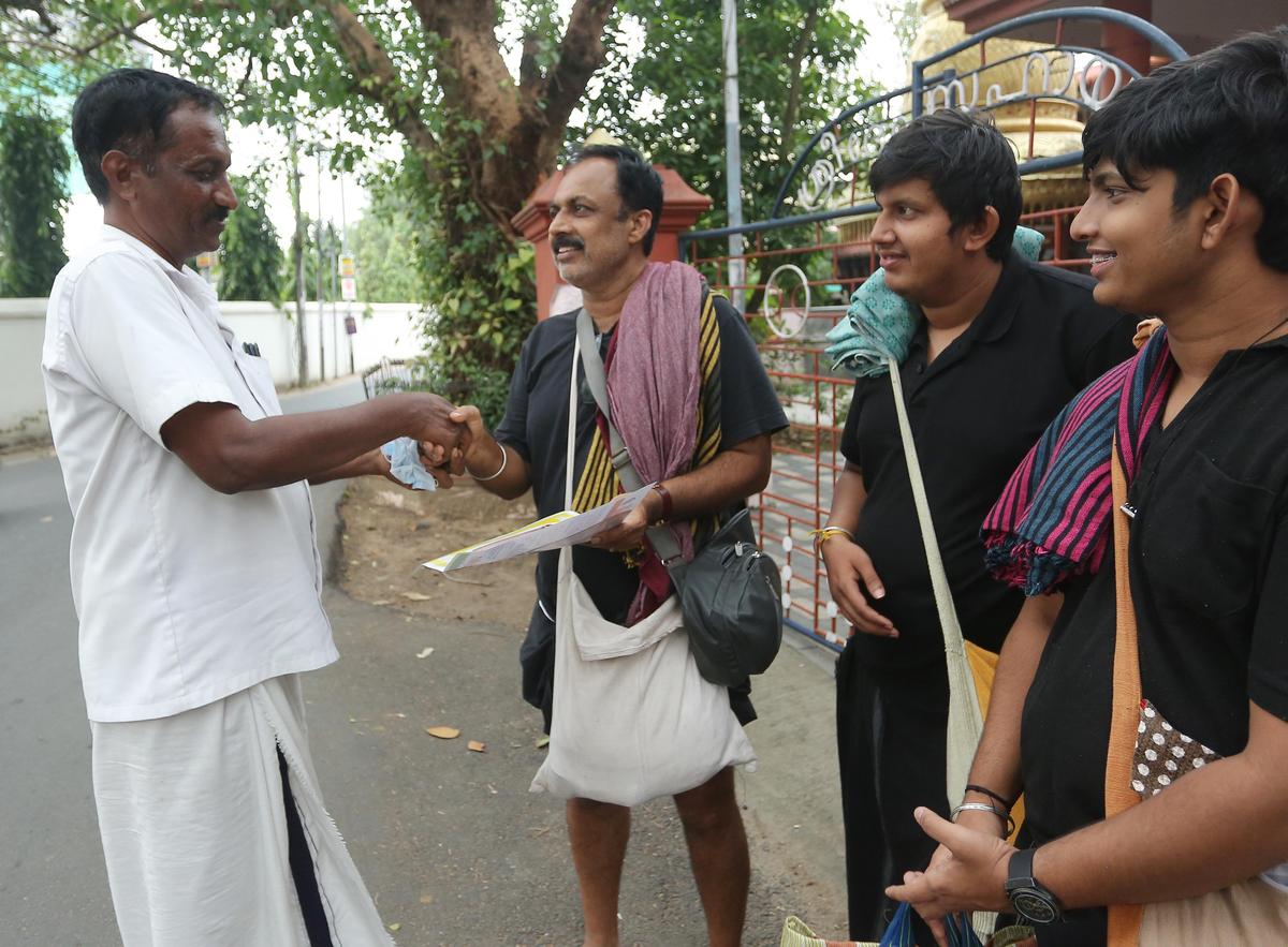 NDA candidate T.P. Pradeep Kumar reaching out to residents in the division as part of his campaign.