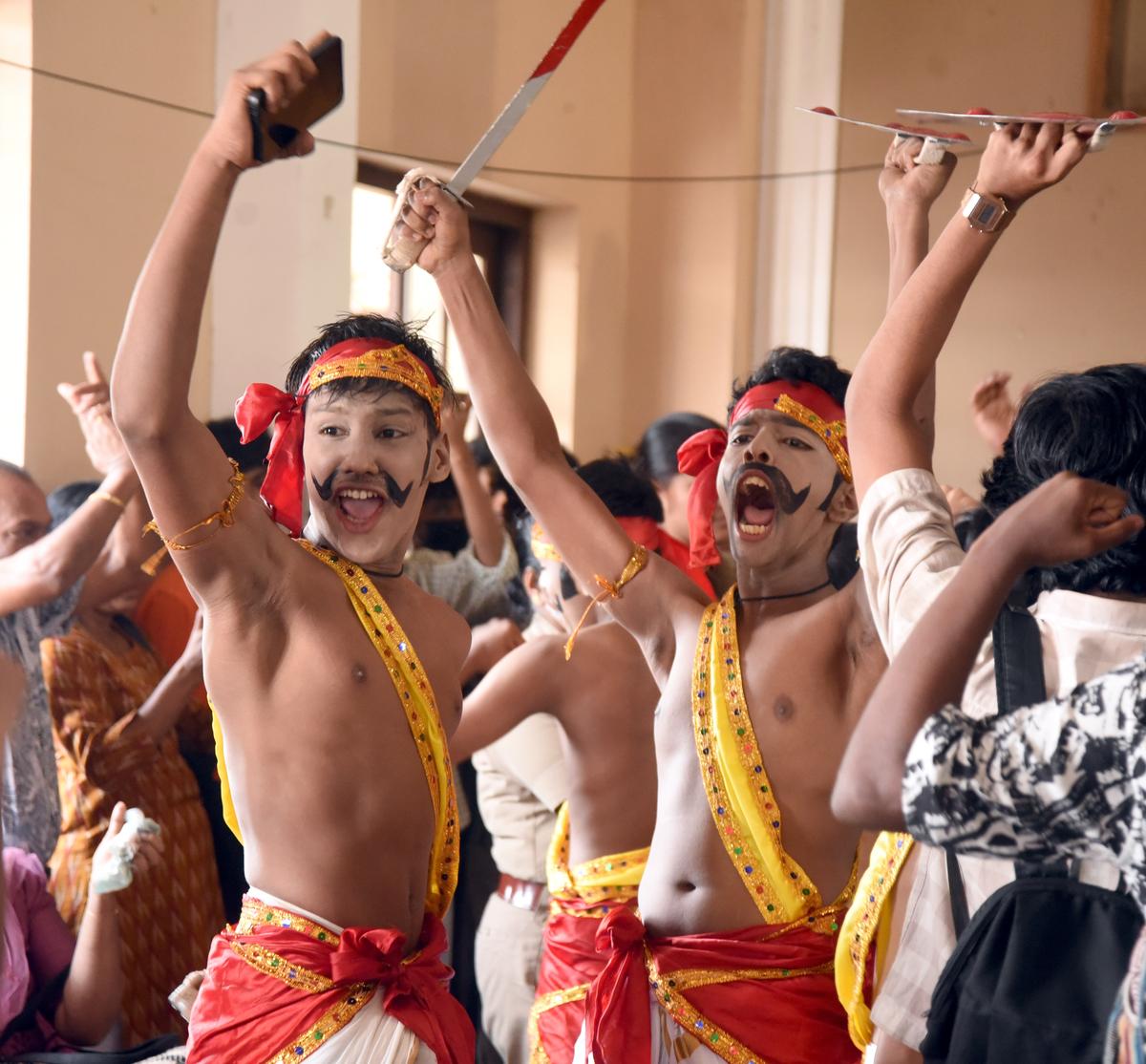 The team of Sree Narayana HS celebrating their victory in Parichamuttukali (HS).
