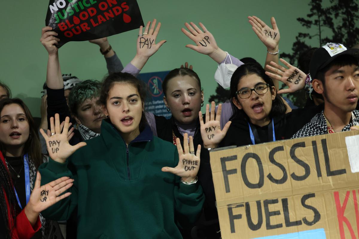 In one voice: Activists protest for climate finance grants for poor countries.