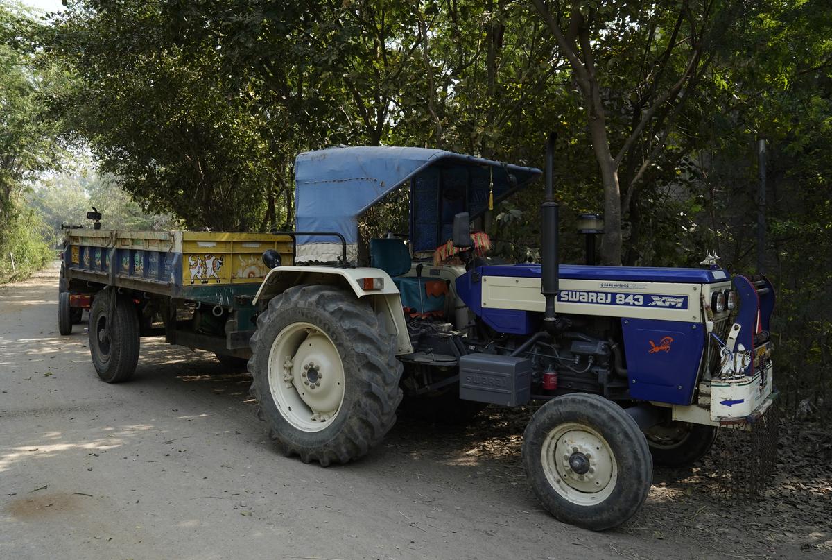 Parked tractors used to clear debris in Bagh-e-Naya Qila in Golconda Fort, Hyderabad.