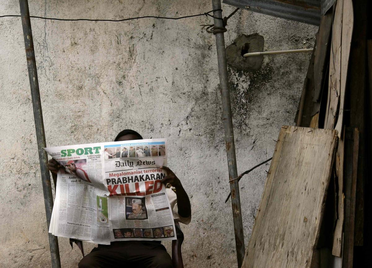 A local newspaper in Sri Lanka reports the death of Prabhakaran, after his killing by government troops, in central Colombo, in 2009. 